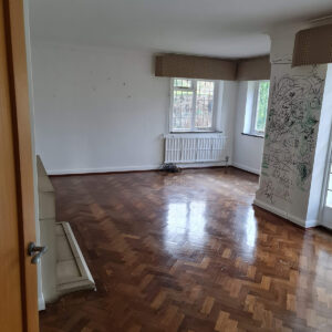 Living room with parquet flooring before house refurbishment in Weybridge