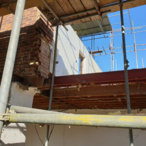 Structural steel framework installed across the rear house extension in Weybridge