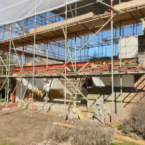 Weybridge house extension and scaffolding during structural construction by Art & Build Ltd