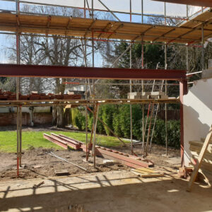 Rear extension steel framework under construction at the Weybridge property
