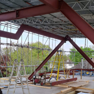 Steel beam framework supporting the upper floor of the Weybridge house extension