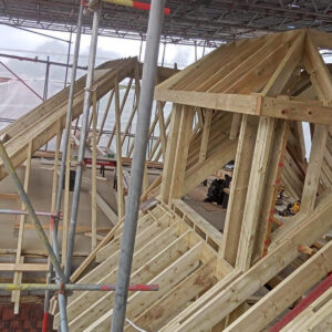 Loft roof timber construction underway during the major Weybridge refurbishment