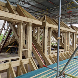Loft conversion roof structure under construction in Weybridge by Art & Build Ltd construction company