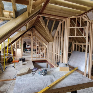 Loft conversion interior framing in Weybridge by Croydon-based builders Art & Build Ltd