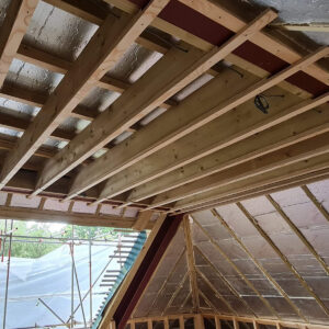Roof insulation installation during the Weybridge loft conversion by Art & Build Ltd