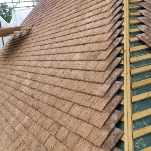 Roof tiling installation during the full Weybridge house refurbishment by Croydon-based builders Art & Build Ltd