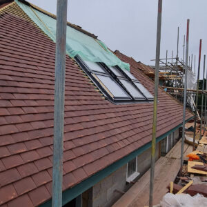 Finished roof tiling and rooflights on the Weybridge loft conversion by Croydon-based builders Art & Build Ltd