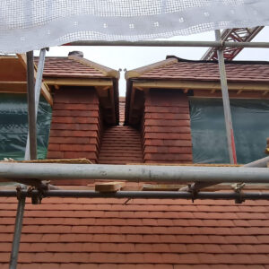 New dormer cladding and tiled roofs installed by Art & Build Ltd, a Croydon-based construction company