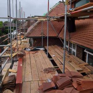 Roof works and scaffolding during the Weybridge loft conversion by Croydon-based builders Art & Build Ltd