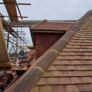 Finished tiled roof over the Weybridge house extension and loft conversion