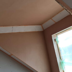 Plasterboard installation in a Weybridge loft room by Art & Build Ltd, a Croydon-based construction company