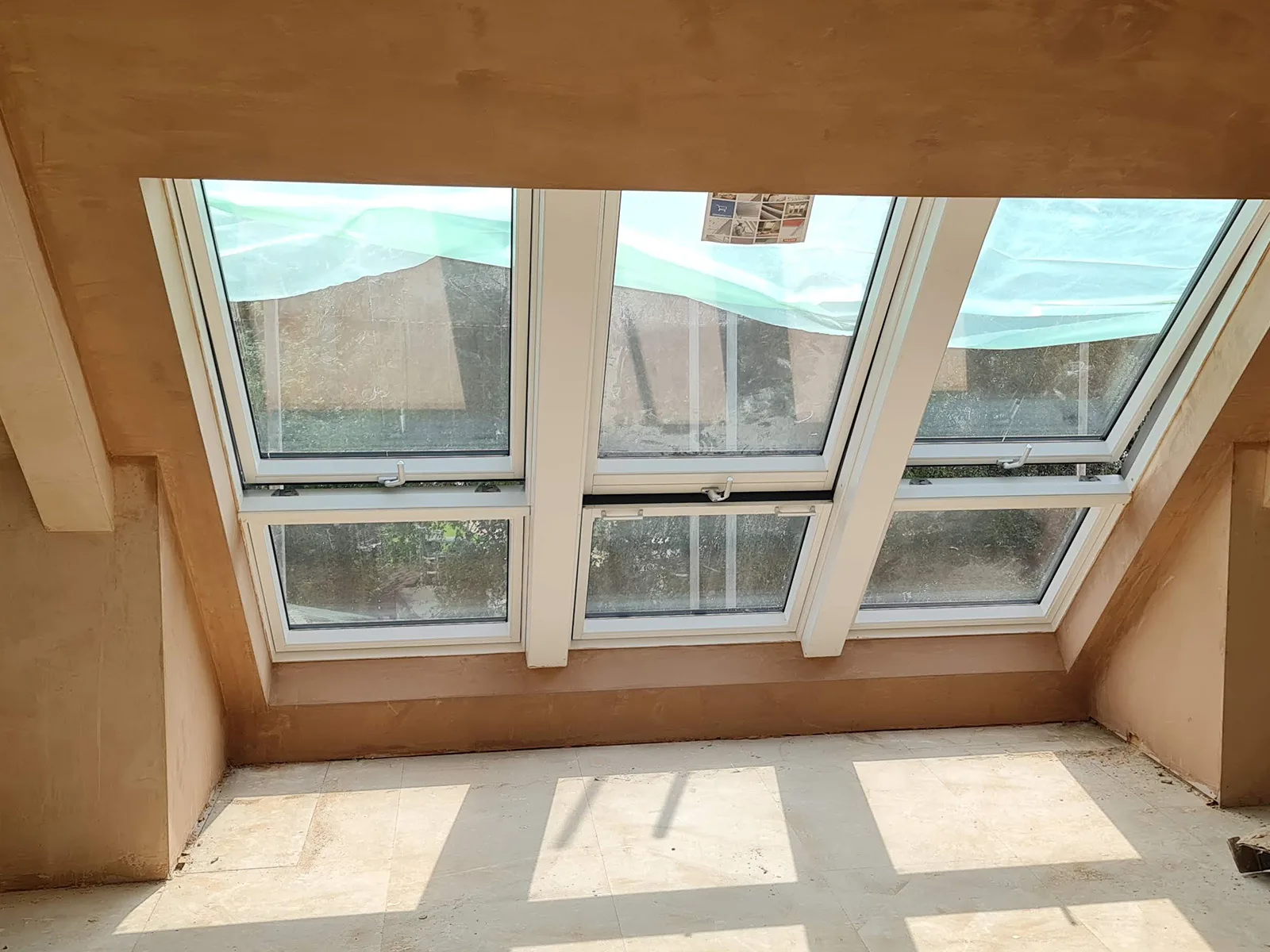 Large roof window installation within the Weybridge loft conversion