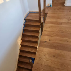 Oak staircase and landing installed during the full Weybridge house refurbishment