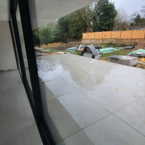 New patio viewed from the Weybridge house extension by Croydon-based builders Art & Build Ltd