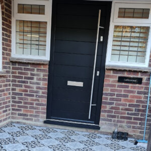 Modern front door installed during the Weybridge refurbishment by Croydon-based builders Art & Build Ltd