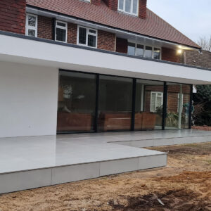 Modern house extension and patio completed in Weybridge by Croydon-based construction company Art & Build Ltd