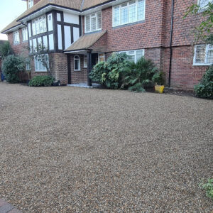 Refurbished front driveway at the completed Weybridge property by Art & Build Ltd