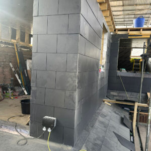 Rear dormer exterior covered with grey slate cladding during construction, by Croydon-based builders Art & Build Ltd