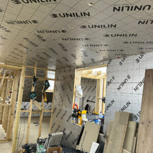 Insulated loft roof with new timber partition framing beneath, by Croydon loft conversion builders Art & Build Ltd