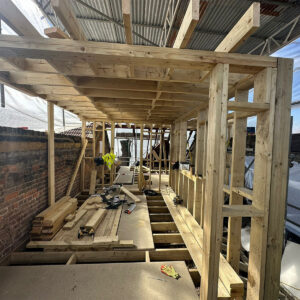 New timber floor structure and framed walls inside a loft conversion, by the Croydon-based team at Art & Build Ltd