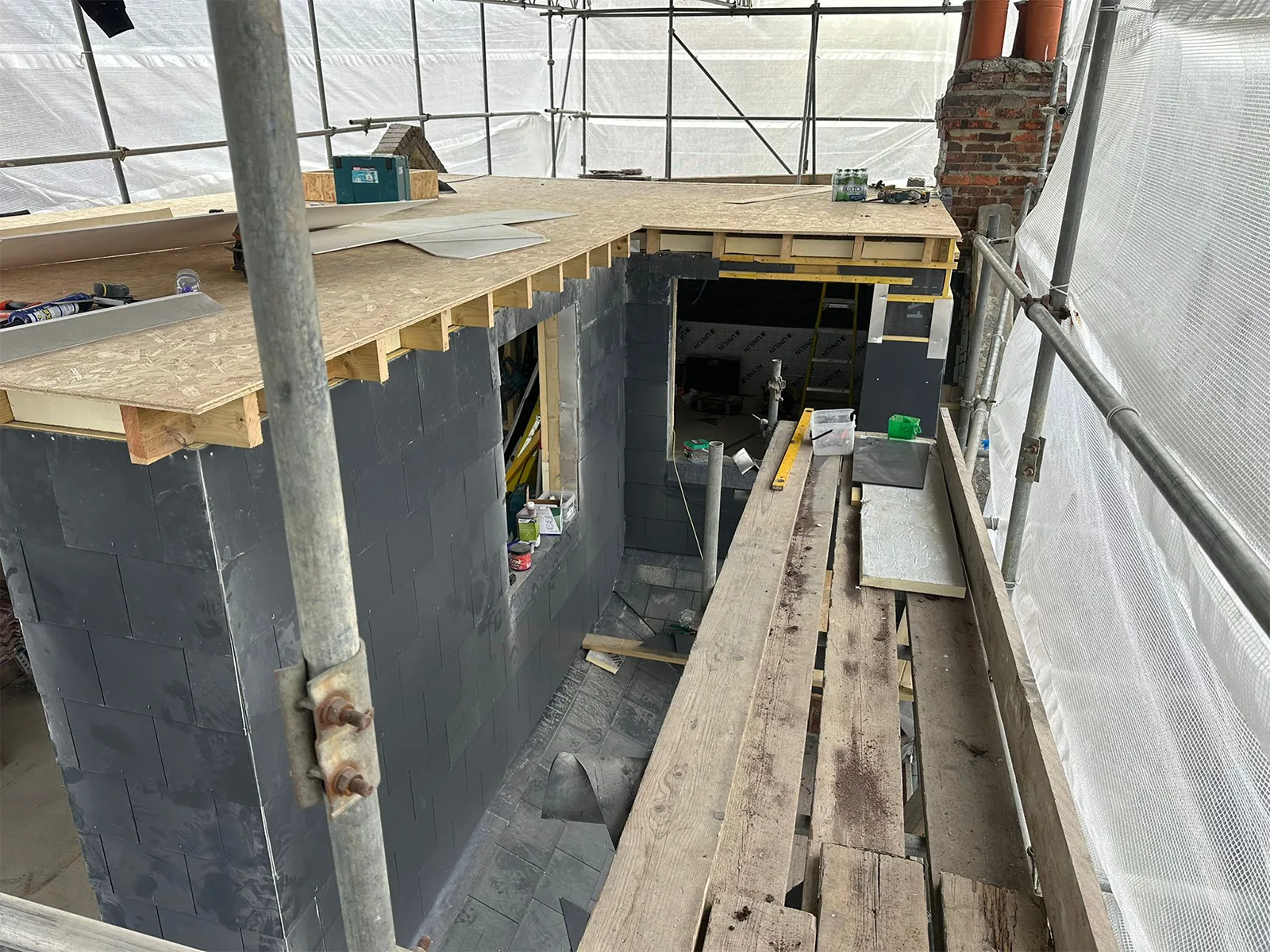 Roof terrace structure with insulation and decking preparation during loft conversion on Byegrove Road