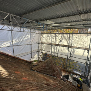 Original tiled roof before stripping work for a loft conversion in South London