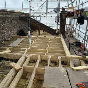 New timber floor joists installed across the loft conversion structure in South London
