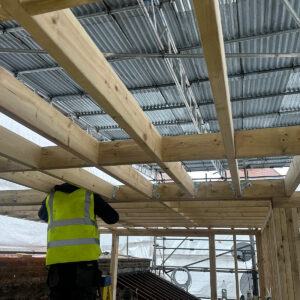 Croydon-based loft conversion builders installing upper timber framing on a Southwark project