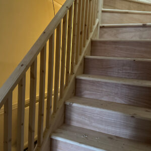 New timber loft staircase with matching handrail and balustrade installed in Southwark