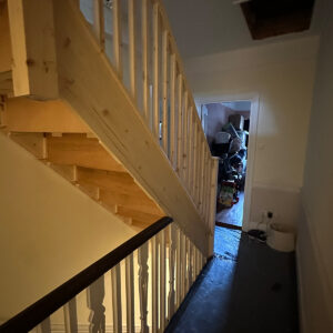 Side view beneath a new loft staircase and landing during construction in Southwark