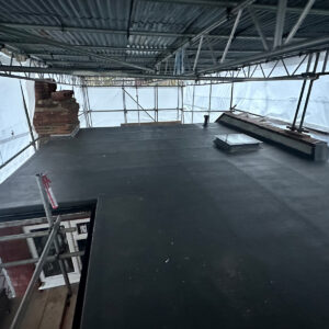 Completed waterproof flat roof across an L-shaped dormer loft conversion in Southwark