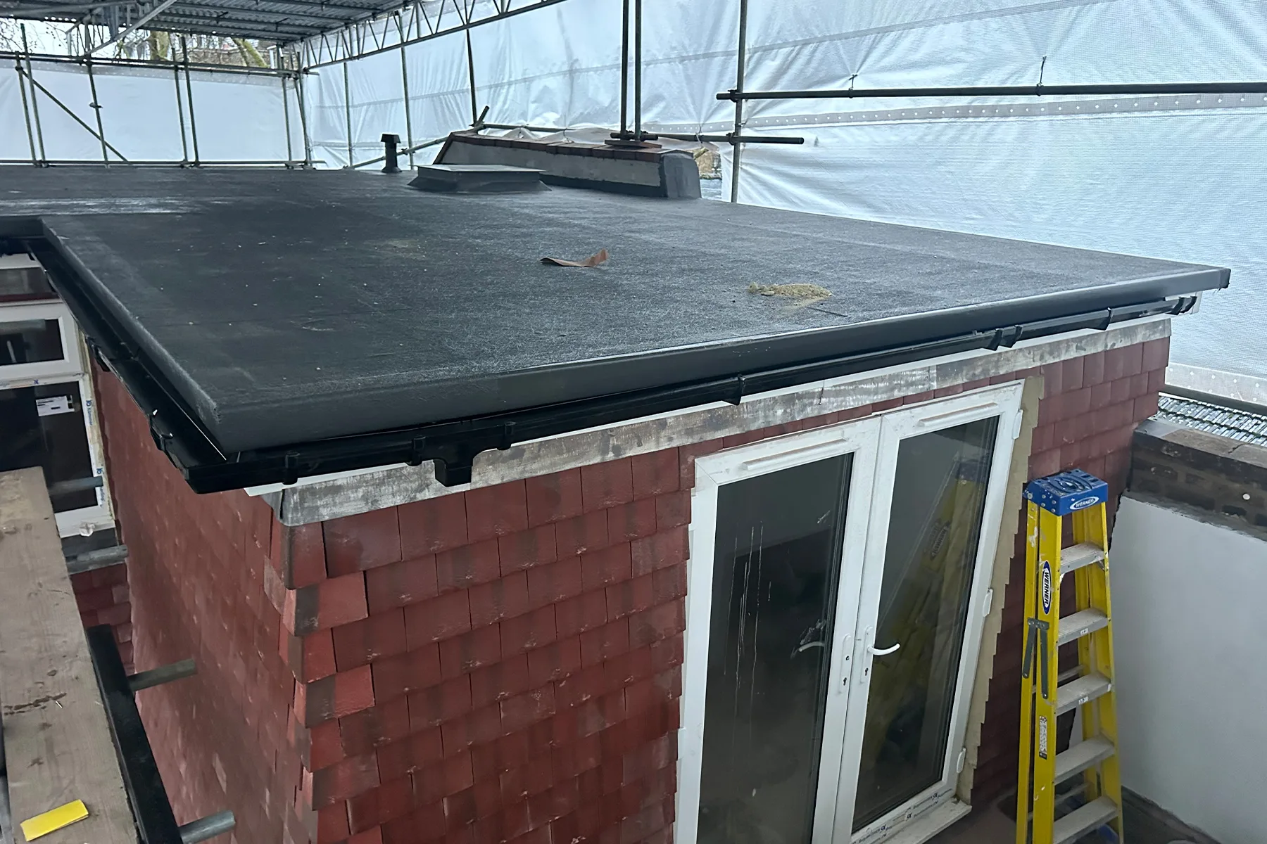 Flat roof installation on rear dormer loft conversion in Croydon