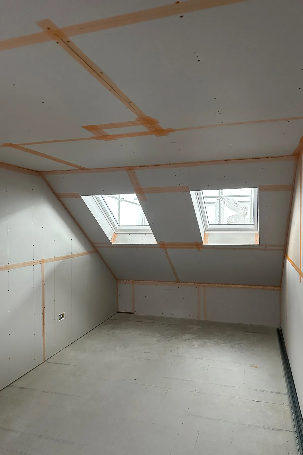 Plasterboard installation in loft bedroom during Croydon loft conversion