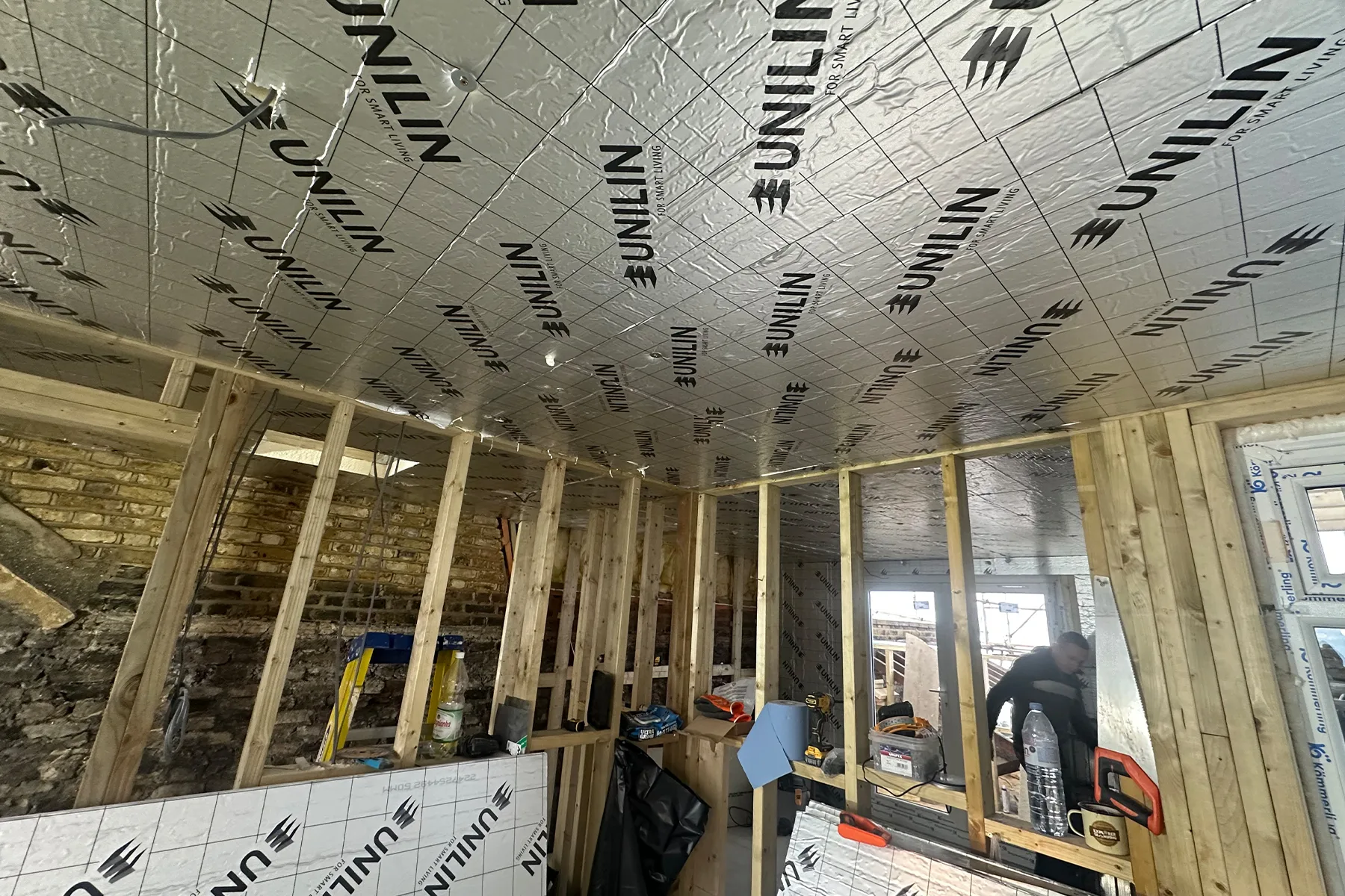 Dormer frame and insulation works during rear dormer loft conversion in Croydon
