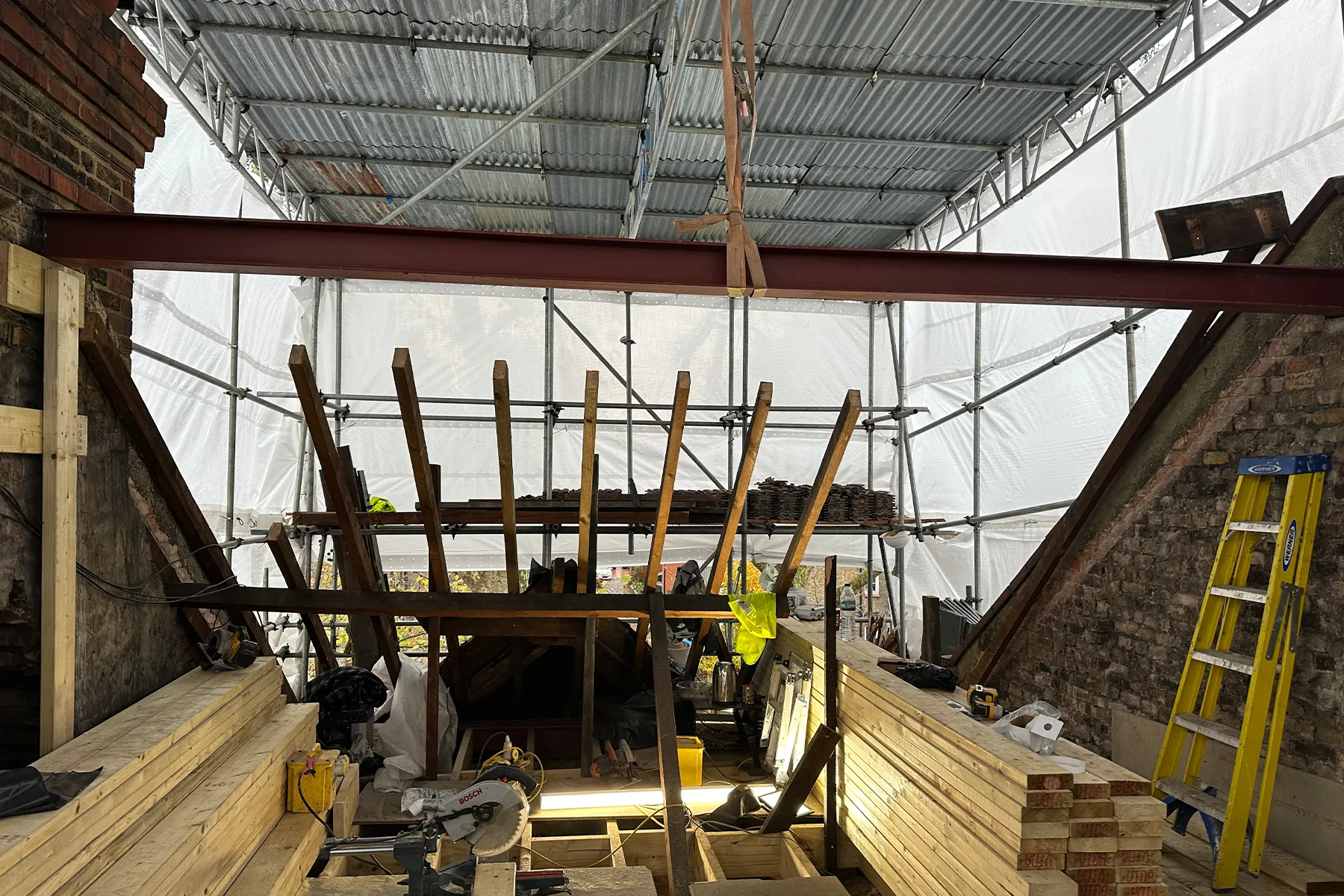 Dormer construction progress during loft conversion in Croydon