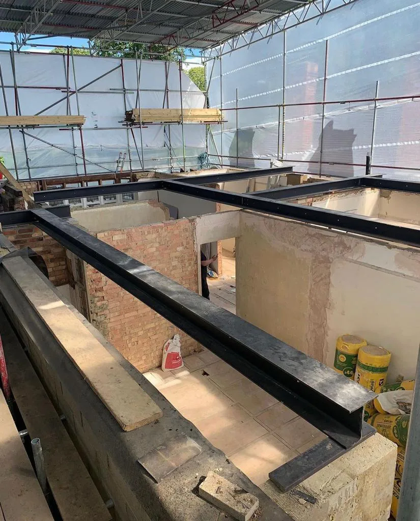 Structural steel beams installed during a loft conversion project by Art & Build Ltd in Croydon