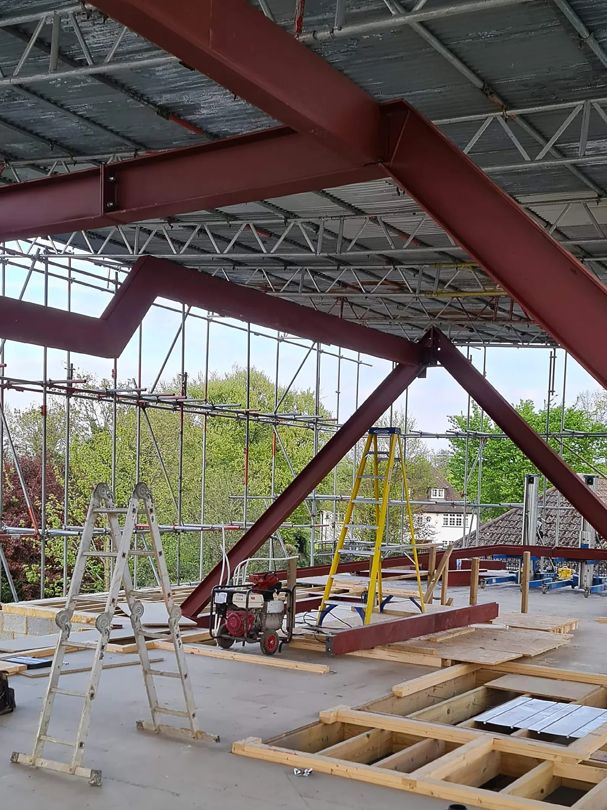 Steel beam framework installation by Art & Build Ltd during a residential building project in Weybridge