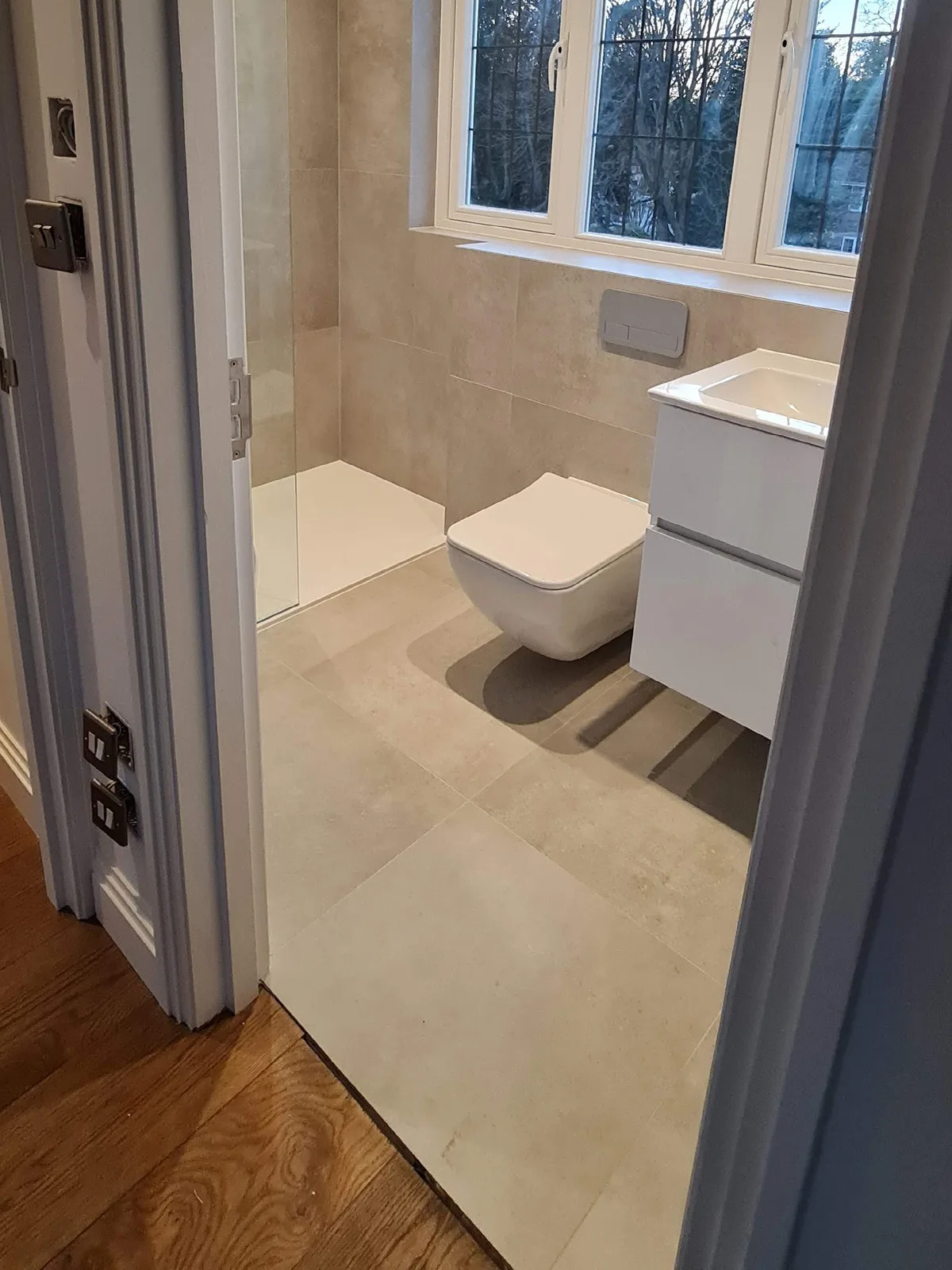 Modern bathroom installation by Art & Build Ltd as part of a residential renovation project in Weybridge