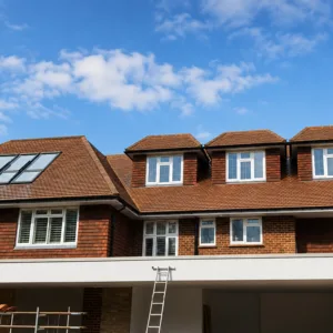 Completed house extension and loft conversion in Weybridge by Art & Build Ltd with dormer windows and Velux roof window