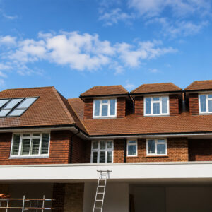 Completed house extension and loft conversion in Weybridge by Art & Build Ltd with dormer windows and Velux roof window