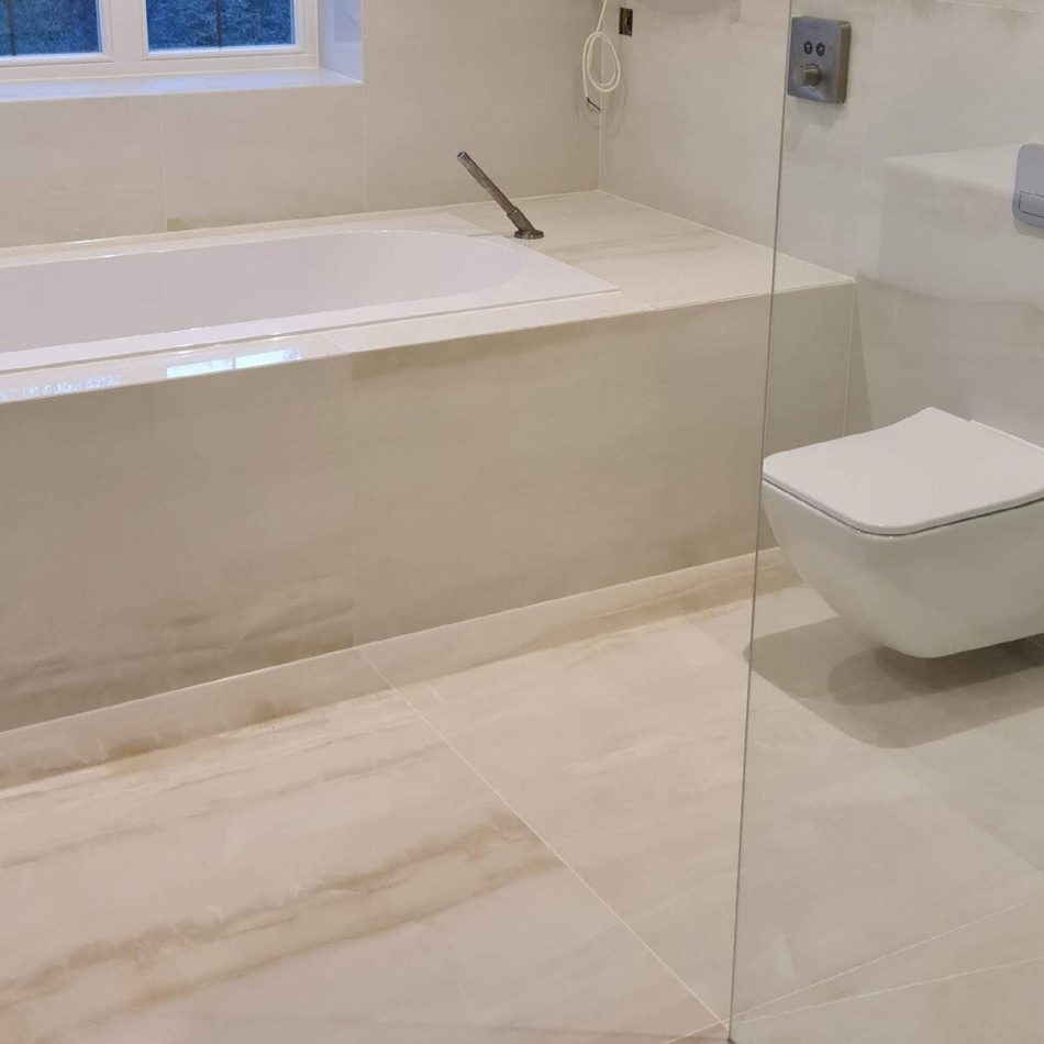 Luxury bathroom with built-in bath completed by Art & Build Ltd in Weybridge